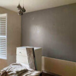 Image looking at the original feature wall battleship grey colour.